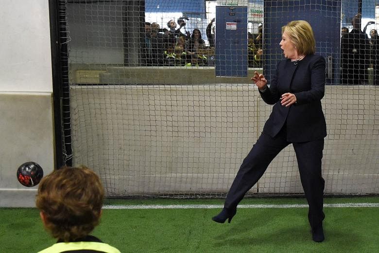 Contender Hillary Clinton playing goalkeeper at the Las Vegas Indoor Sports Centre in Nevada on Saturday, ahead of the state's party caucus on Feb 20. She has said a vote for her is a vote for safe hands, given her years in government.