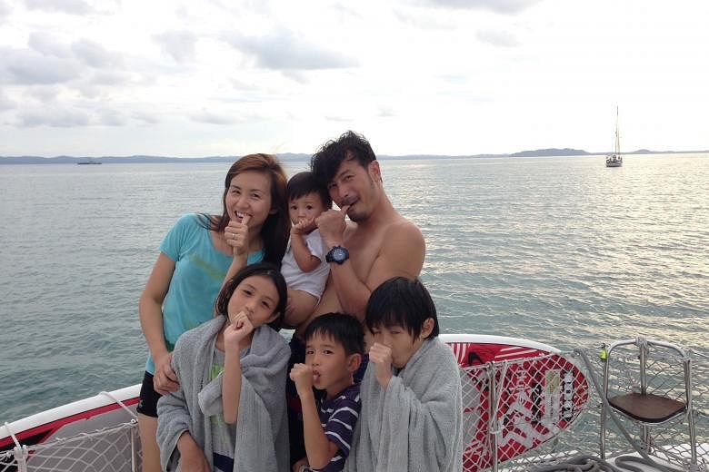 Former actress Evelyn Tan and husband, actor Darren Lim, with two-year-old son Elliott and their other children (front, from left) Kristen, 11, Way, seven, and Jairus, nine, on their trip to Sibu, Malaysia, last year.