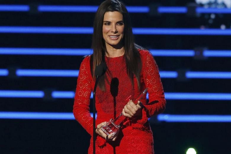 Sandra Bullock (above) kept the adoption of her second child a secret before an exclusive People magazine cover story.