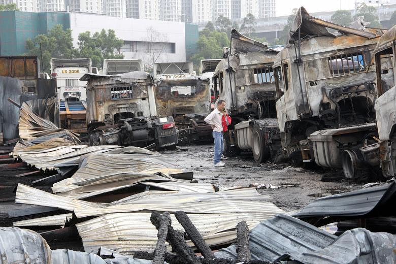 A suspected arson attack has destroyed 32 vehicles, including coaches, trucks and tractors, parked at an outdoor carpark in Hong Kong's Lai Chi Kok in New Kowloon, the South China Morning Post reported. No casualties were reported following the fire,