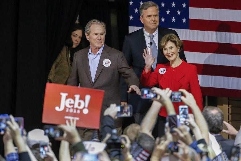 US Republican presidential candidate Jeb Bush (centre) at a campaign event with his brother, former US president George W. Bush, and former first lady Laura Bush in North Charlestonon Monday. South Carolina Republicans vote in their primary this Satu