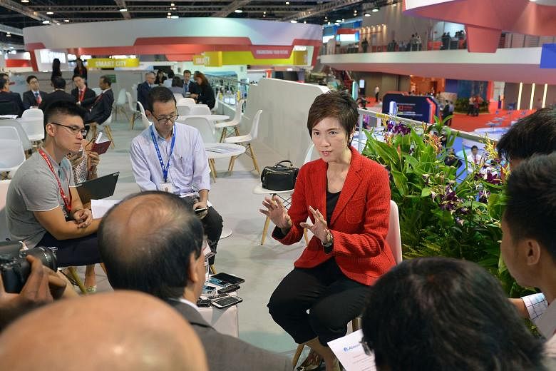 Senior Minister of State for Transport Josephine Teo talking to the media yesterday at the Singapore Airshow. She said that apart from Singapore beefing up its air traffic management capabilities, it is also vital for Asean countries to cooperate to 