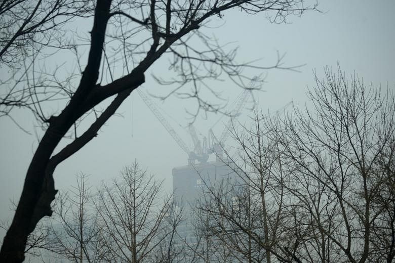 Heavy smog in Beijing during one of the city's three "airpocalypses" late last year. The authorities insist, however, that air quality in the Chinese capital has improved over the past two years.