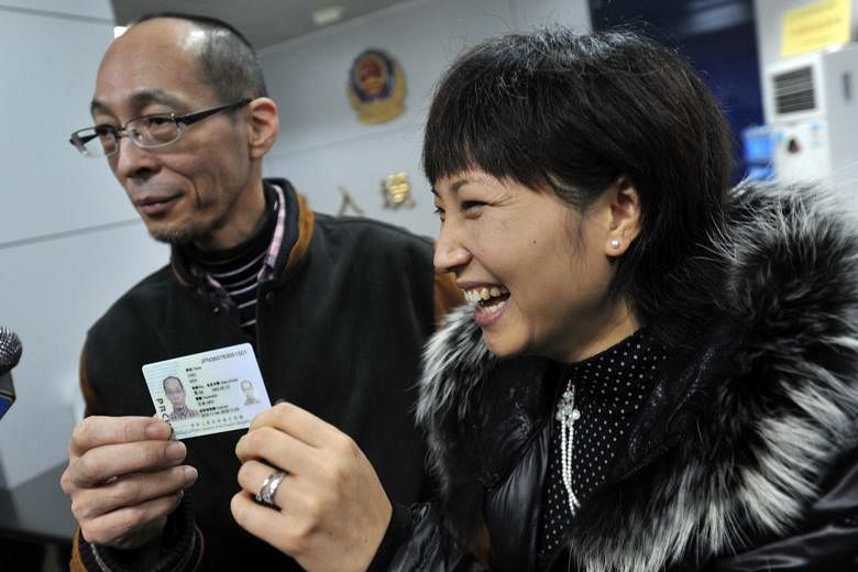A Japanese couple collecting their green cards at an immigration office in Ganzhou, Jiangxi province. More than 7,300 foreigners had obtained permanent residency in China by 2013, but that is but a fraction of the 600,000 foreigners there. China hope