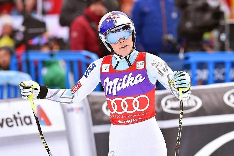 Lindsey Vonn of the US reacting after taking second place in the women's downhill race of the Alpine Skiing World Cup. She is now assured of a record eighth crown in the discipline.