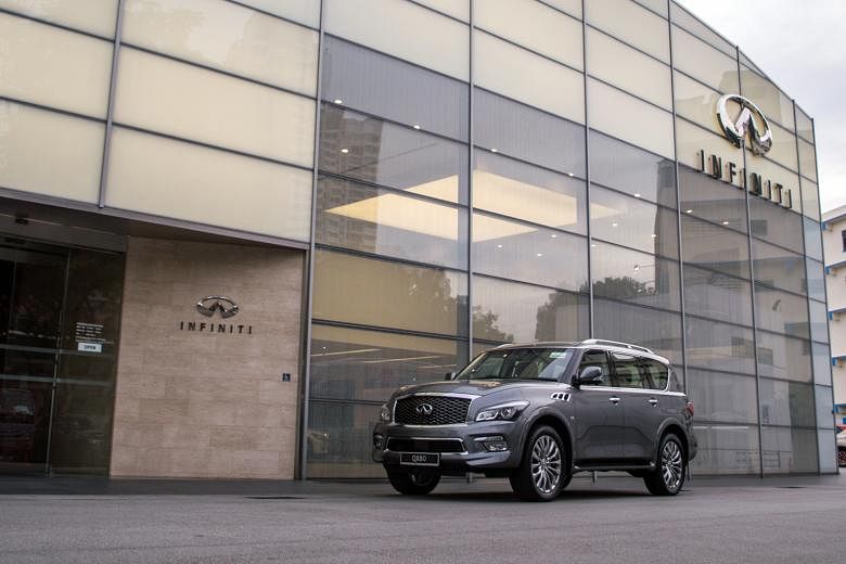 The Infiniti QX80 towers over the other SUVs on Singapore roads at 1.95m tall.