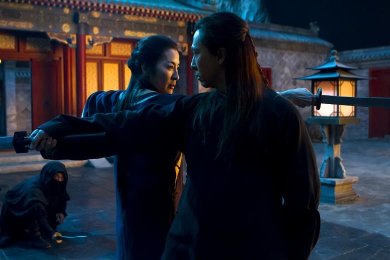 Donnie Yen, as Silent Wolf, is the new old flame to Michelle Yeoh's (both above) swordswoman in Crouching Tiger, Hidden Dragon: Sword Of Destiny.