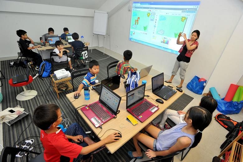 Children attending a coding class organised by Saturday Kids last June. Rising demand has led coding schools to provide regular weekly classes or workshops throughout the year rather than only during the holidays. Children are taught Scratch programm