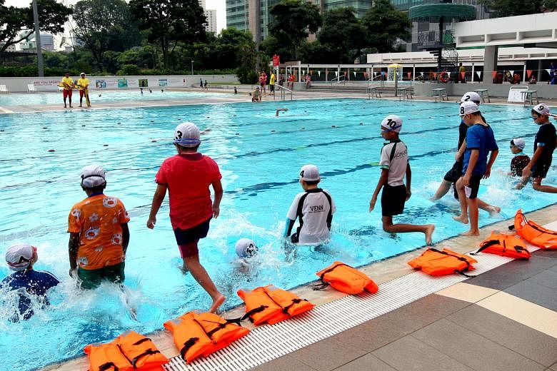 Children taking swimming lessons at Toa Payoh Swimming Complex. Figures from KKH show there were 104 drownings and near-drownings involving children between 2011 and last year. Five drowning victims had been at pool parties at the time. Dr Arif Tyeba
