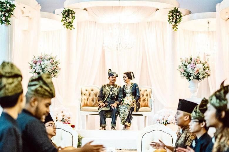 Mr Raizan and Ms Farhana held their wedding reception at Ulu Pandan Community Club on Jan 11. They were willing to spend more for air-conditioning plus they felt the void deck at their home was not ideal as space was limited, with obstructions like f