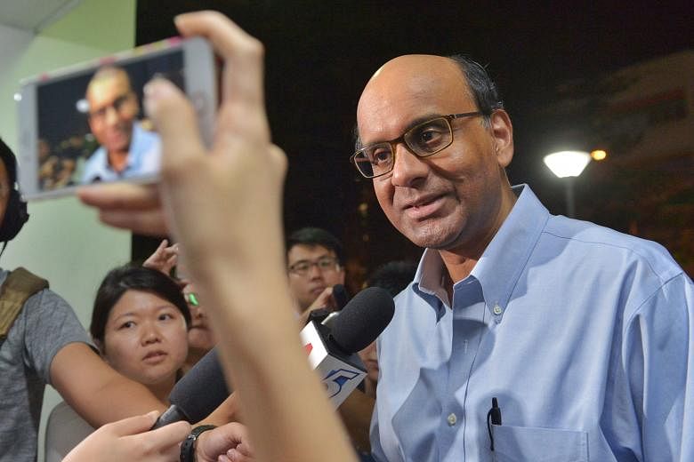 Mr Tharman speaking to reporters in Bukit Batok, where he met residents at the Meet-the-People Session last night. He said that the PAP's candidate to replace Mr David Ong will be "someone committed to the interest of Bukit Batok residents, and who w