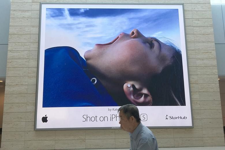 A billboard of a photo shot on an iPhone 6. While smartphones are hard to beat on convenience, cameras have the edge in photo quality.