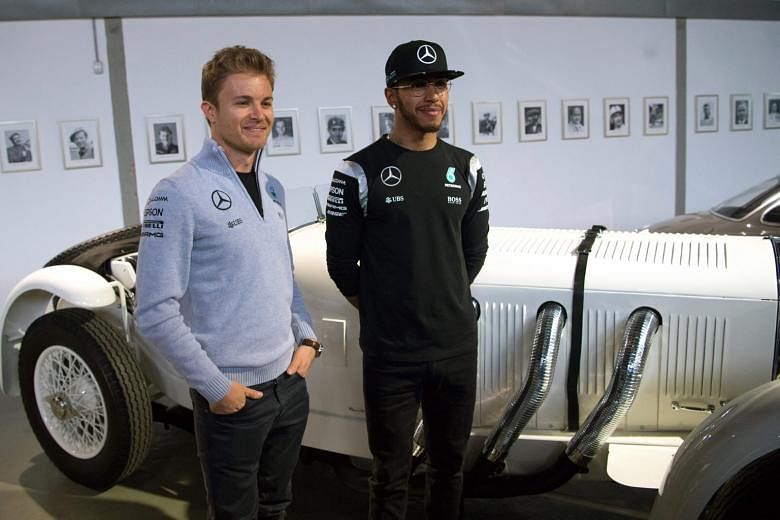 Reigning world champion Lewis Hamilton (right) and Mercedes team-mate Nico Rosberg encountered a symbol of their team's sporting history - a Mercedes-Benz SSK - in Germany last week.
