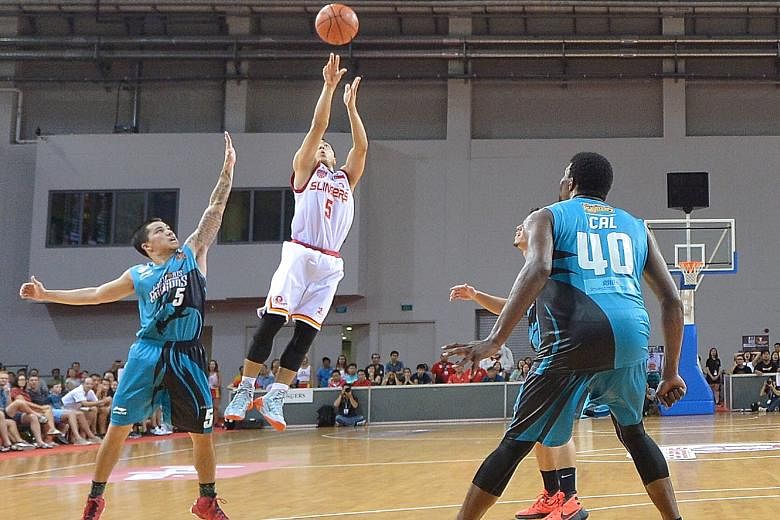 As the buzzer goes at the end of the fourth quarter, Wong Wei Long (No. 5) launches the shot that broke the 73-73 deadlock against the Malaysia Dragons to seal Game 4 and level the best-of-five ABL Finals series.