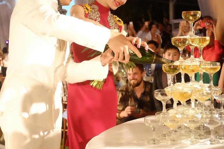 Nicky Wu and Liu Shishi at their wedding banquet in Bali on Sunday.