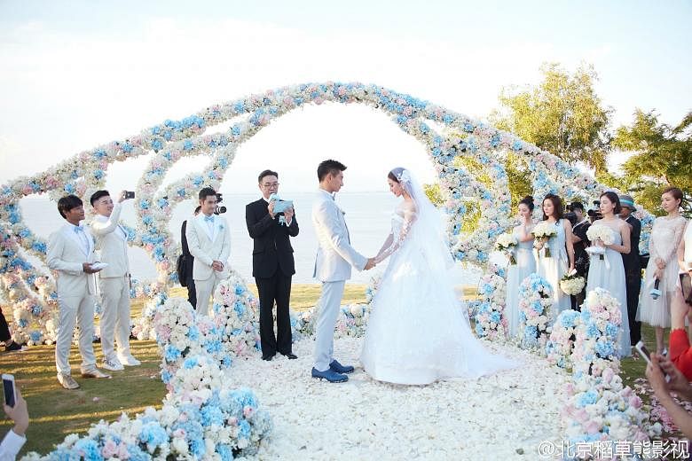 Damian Lau (in black) officiating at Nicky Wu and Liu Shishi's wedding, where (from left) Little Tigers Julian Chen and Alec Su, as well as actors Yuan Hong, Cristy Guo and Annie Liu are guests.