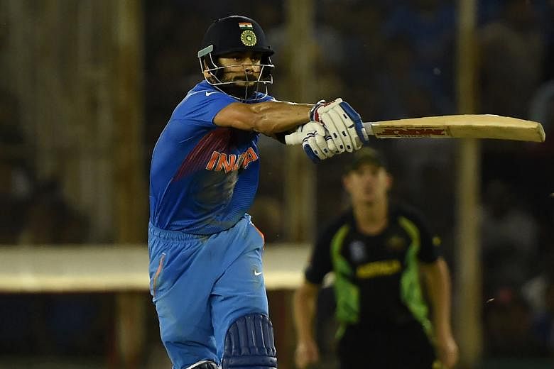 Virat Kohli playing a shot in India's six-wicket win over Australia in Sunday's World Twenty20 match. His superb unbeaten 82 off 51 balls that mixed classic strokeplay with raw power prompted comparisons with his famous compatriot Sachin Tendulkar.