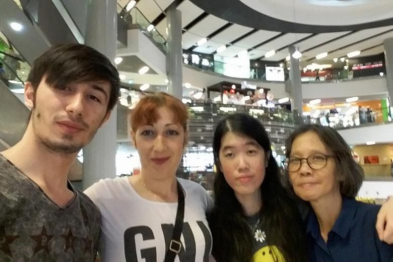 Ms Yap and her mother, Madam Foo, with Mr Donea and his mum Aurelia at a mall in Singapore. The Singaporean women, who were feared missing in Romania earlier this year, returned home two weeks ago.