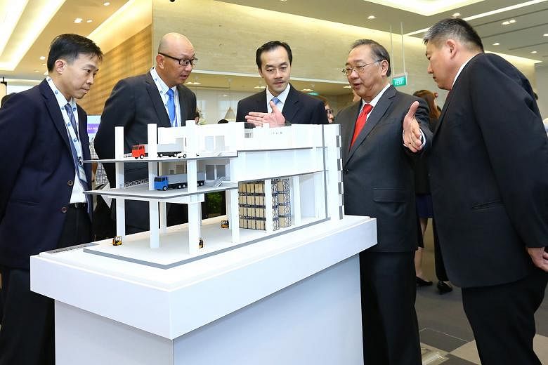 (From left) JTC chief executive Png Cheong Boon; Mr Leong Hong Yew, JTC's director (food & lifestyle cluster); Minister of State Koh Poh Koon; Mr George Huang, emeritus president of Singapore Manufacturing Federation; and Mr Thomas Pek, president of 