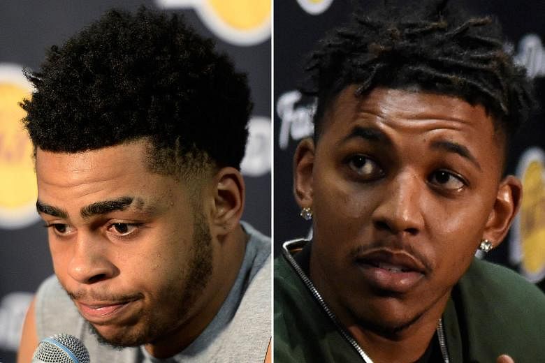 D'Angelo Russell (top) has apologised to Nick Young (above) regarding the video he secretly filmed in which Young was talking about women other than fiancee Iggy Azalea.