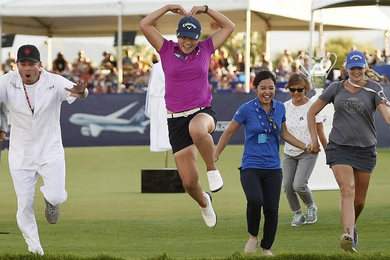 World No. 1 Lydia Ko jumps into Poppie's Pond after winning the ANA Inspiration at Mission Hills Country Club. The New Zealander followed up last year's Evian Championship victory with this win to make her the youngest golfer in 147 years to hold two
