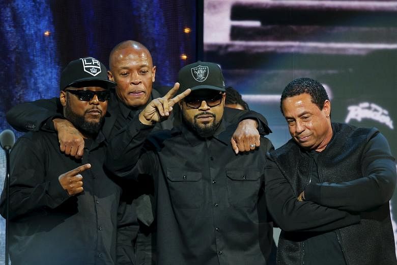 N.W.A's (from left) MC Ren, Dr Dre, Ice Cube and DJ Yella at last Friday's Hall of Fame induction ceremony.