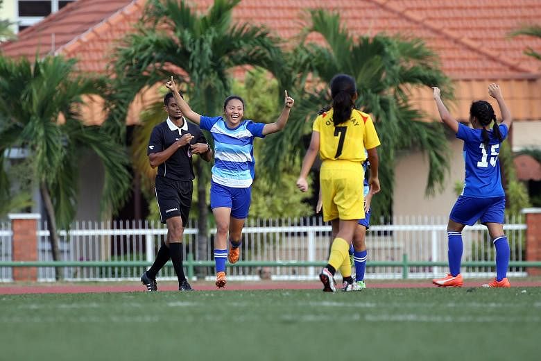 Ong Yan Ting shows her glee after coming off the bench to score Bowen's first goal of the B Division girls' football final against Queensway yesterday. Bowen reclaimed the title with a 2-0 win.