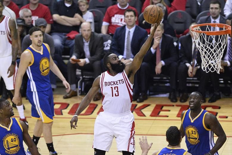 Houston shooting guard James Harden going to the basket against Golden State in Game 3. The Rockets' one-point win ensures they get a return trip to Oakland.