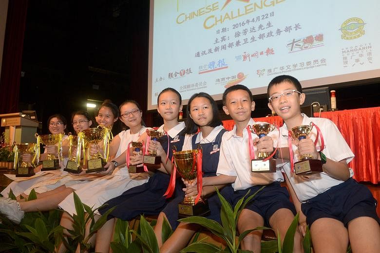 The National Chinese Challenge was won by Nanyang Girls' High School in the secondary school category and Rosyth School in the primary school category. From left: The NYGH team of Lim Tse Hwee, 15; Ye Yu Tong, 16; Neo Xuan Ling, 16; and Cai Xin Rui, 