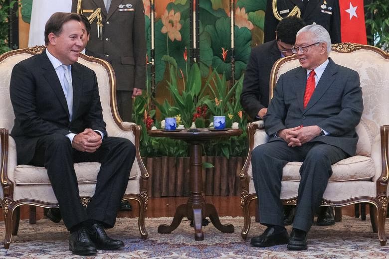 President Tony Tan Keng Yam with Panama President Juan Carlos Varela Rodríguez (left) yesterday. Dr Tan also hosted a state banquet at the Istana in Mr Varela's honour last night. Mr Varela, who was on a two-day state visit, was welcomed at an offic