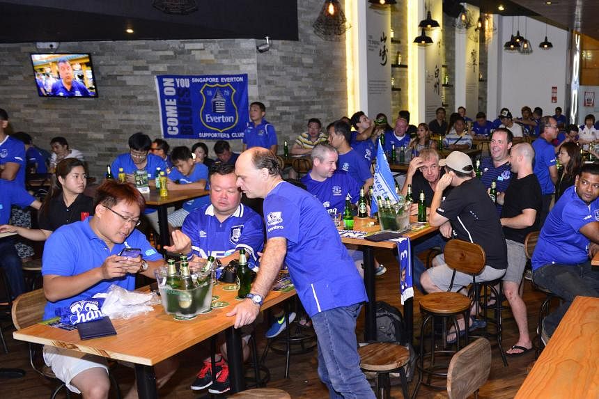 Everton fans at the Chang Beer-The Straits Times pre-screening party on Saturday, ahead of the FA Cup semi-final clash between the Toffees and Manchester United.