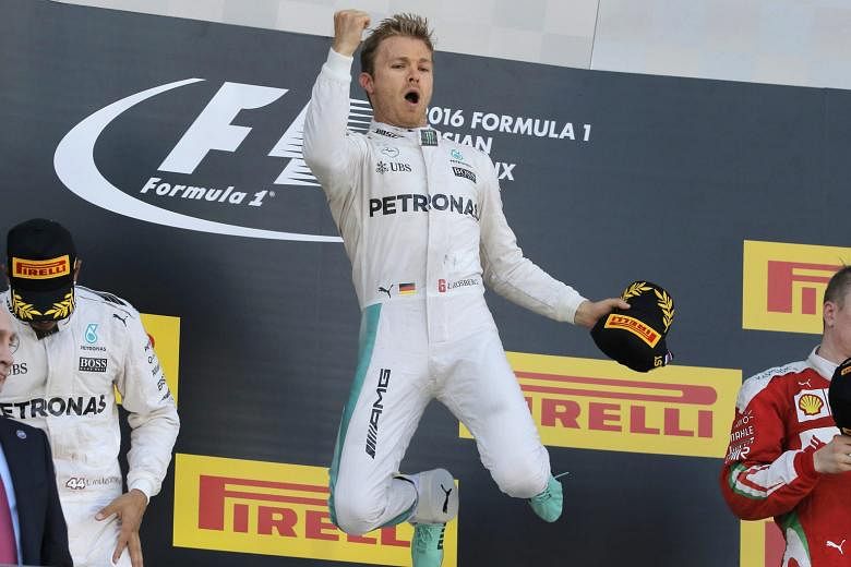 Mercedes driver Nico Rosberg jumps for joy on the podium as he celebrates his Russian Grand Prix victory. The German is the fourth driver in Formula One history to win seven consecutive races.
