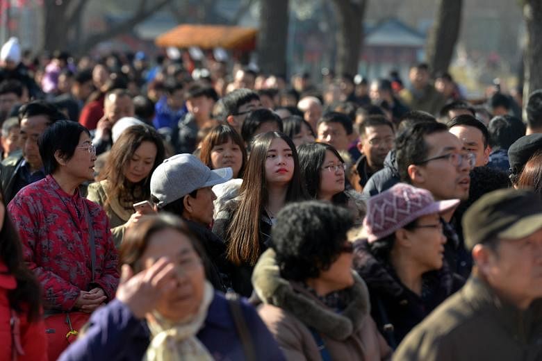 A Chinese New Year crowd in Beijing this year. A study of 206 women aged between 30 and 45 who had lived in the rural and urban areas of Beijing for at least 10 years showed that chronic exposure to toxins and chemicals in the urban environment led u