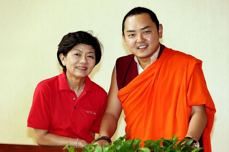 Live to Love Singapore president Tracey Woon and the movement's patron, His Eminence the Gyalwa Dokhampa.