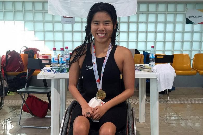 Yip Pin Xiu with her gold medal after winning the 50m back (S2) race at the IPC Swimming European Open Championships. With two backstroke world records, Yip is favourite to win gold at the Rio de Janeiro Paralympics.
