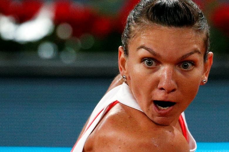 Simona Halep of Romania in action during her 6-2, 6-4 victory against Dominika Cibulkova of Slovakia in the Madrid Open final on Saturday. With Maria Sharapova suspended and Serena Williams in patchy form, Halep is a genuine contender for the French 