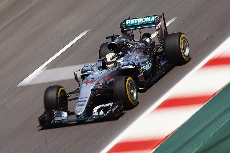 British driver Lewis Hamilton sets a blistering pace during qualifying at the Barcelona-Catalunya circuit. The Mercedes driver will start first on the grid in today's race.
