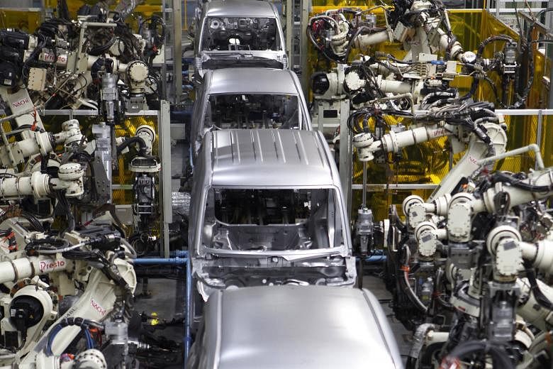 Robots assembling the main body of a vehicle at Daihatsu Motor's Kyushu Oita (Nakatsu) No.2 Plant in Japan. The use of new innovations and technologies, from robotics and the Internet of things to the emergence of virtual reality, will be the decisiv