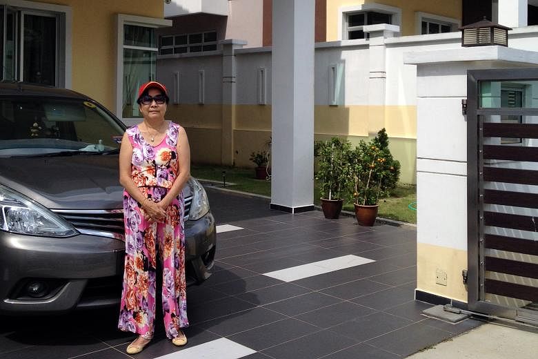 Mrs Amy Tan (left) no longer drives to Singapore, while Ms Noraini Mokhtar (right) spends hours on the road each day commuting between her home in Johor Baru and Singapore.
