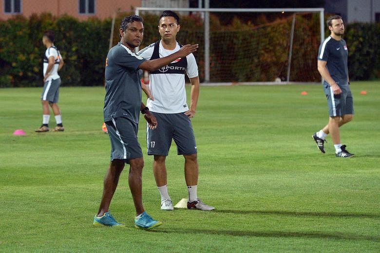Sundram together with national captain Shahril Ishak at his first training session yesterday, after being appointed national coach. "With social media these days and the expectation of the fans, everybody has their views. It won't be an easy role but