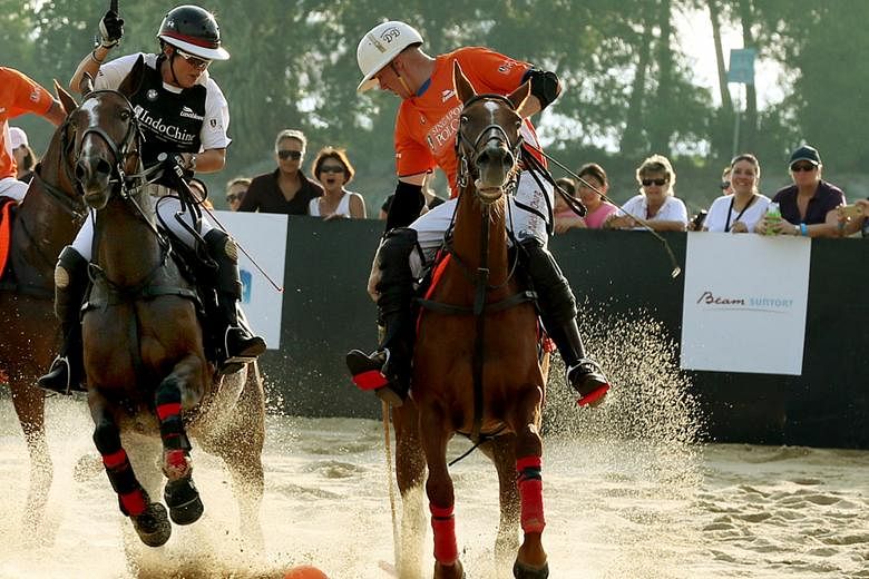 Astride their steeds and expertly swinging their mallets, players from the Oceania (in black) and Asia teams went head to head on Sentosa's Tanjong Beach in the final of the BMW Singapore Beach Polo Championship yesterday. Oceania won 4.5-1. The Amer