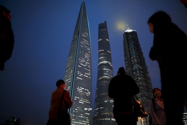 The Pudong financial district in Shanghai, China. Singaporean managers talk about having a presence in Indonesia, China or Vietnam, but say nothing about the promise of the US, Canada or Chile, said Dr Marc Busch.