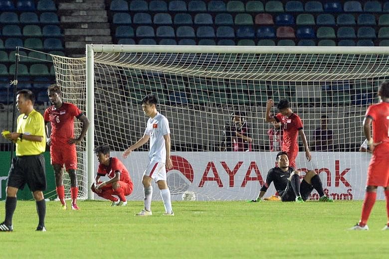 Despair for Singapore in extra time against Vietnam in Yangon. After two matches with new coach Sundram in charge, it is clear he favours the team soaking up pressure and defending deep before hitting on the counter.