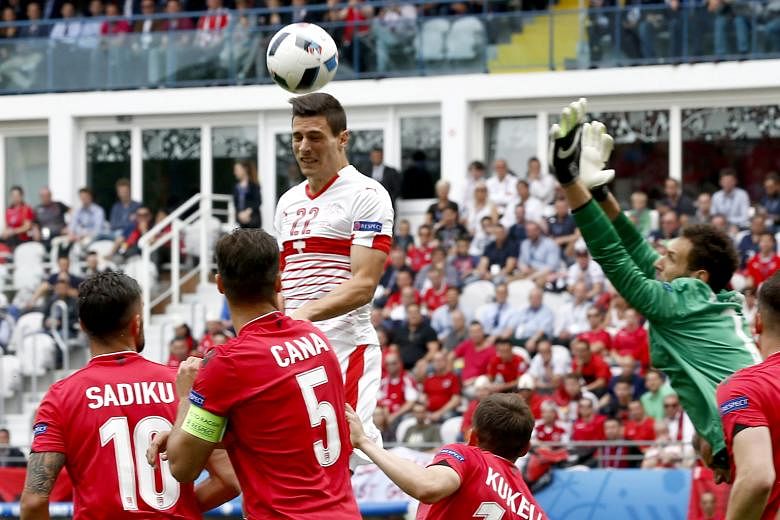 Fabian Schar heading in the only goal in Switzerland's 1-0 win over Albania, after goalkeeper Etrit Berisha totally misjudges the flight of Xherdan Shaqiri's corner.