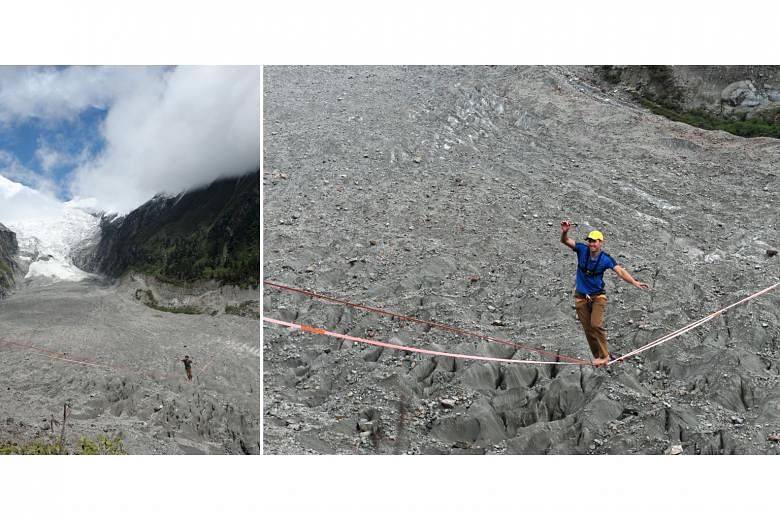Slackline walkers negotiating a line strung across the Hailuogou glacier forest park in China's Sichuan province on Saturday. In a contest, participants were required to walk along a slackline that was 830m long and 3,600m high. French slackline walk