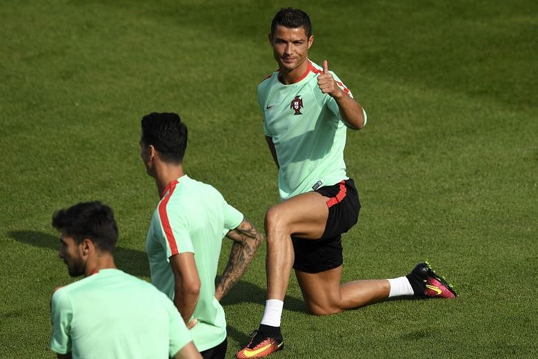 Portugal skipper Cristiano Ronaldo feeling the good vibes during training. His team lost to champions Spain four years ago in the semi-finals.