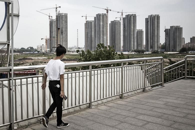 Investment in China's real estate in May posted its first year-on-year slowdown in growth since December although property sales by area surged more than 32 per cent.