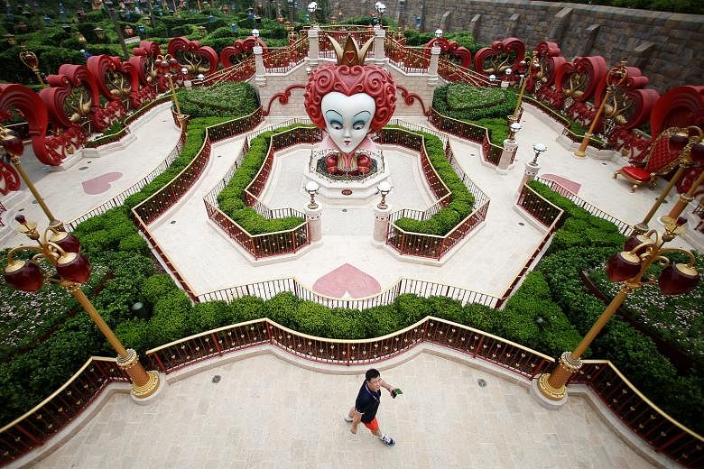 A man visiting Shanghai Disney Resort during a Grand Opening event in Shanghai.