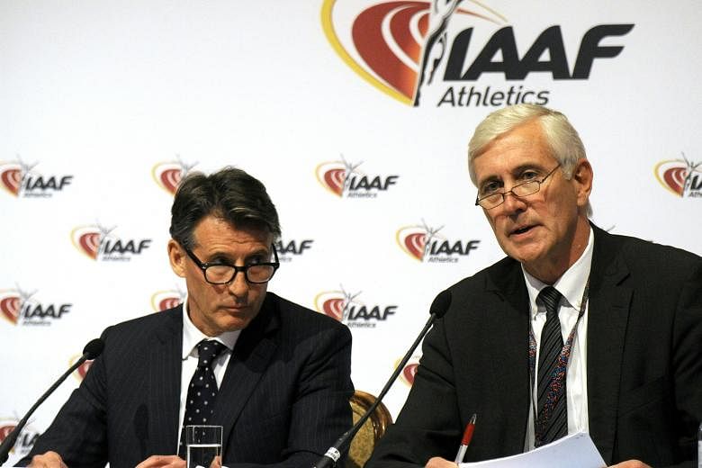IAAF president Sebastian Coe (left) and Rune Andersen, who heads the IAAF task force overseeing Russia's attempts to reform, at the press conference in Vienna on Friday, where the governing body voted unanimously to extend the ban.