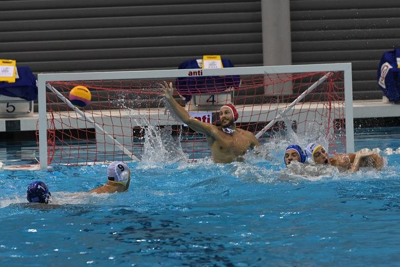 Australia goalkeeper James Stanton is unable to get his hand to this shot in a water polo friendly against Greece at the OCBC Aquatic Centre yesterday. Greece, bronze medallists at last year's Fina World Championships in Russia, won the game 6-4. The